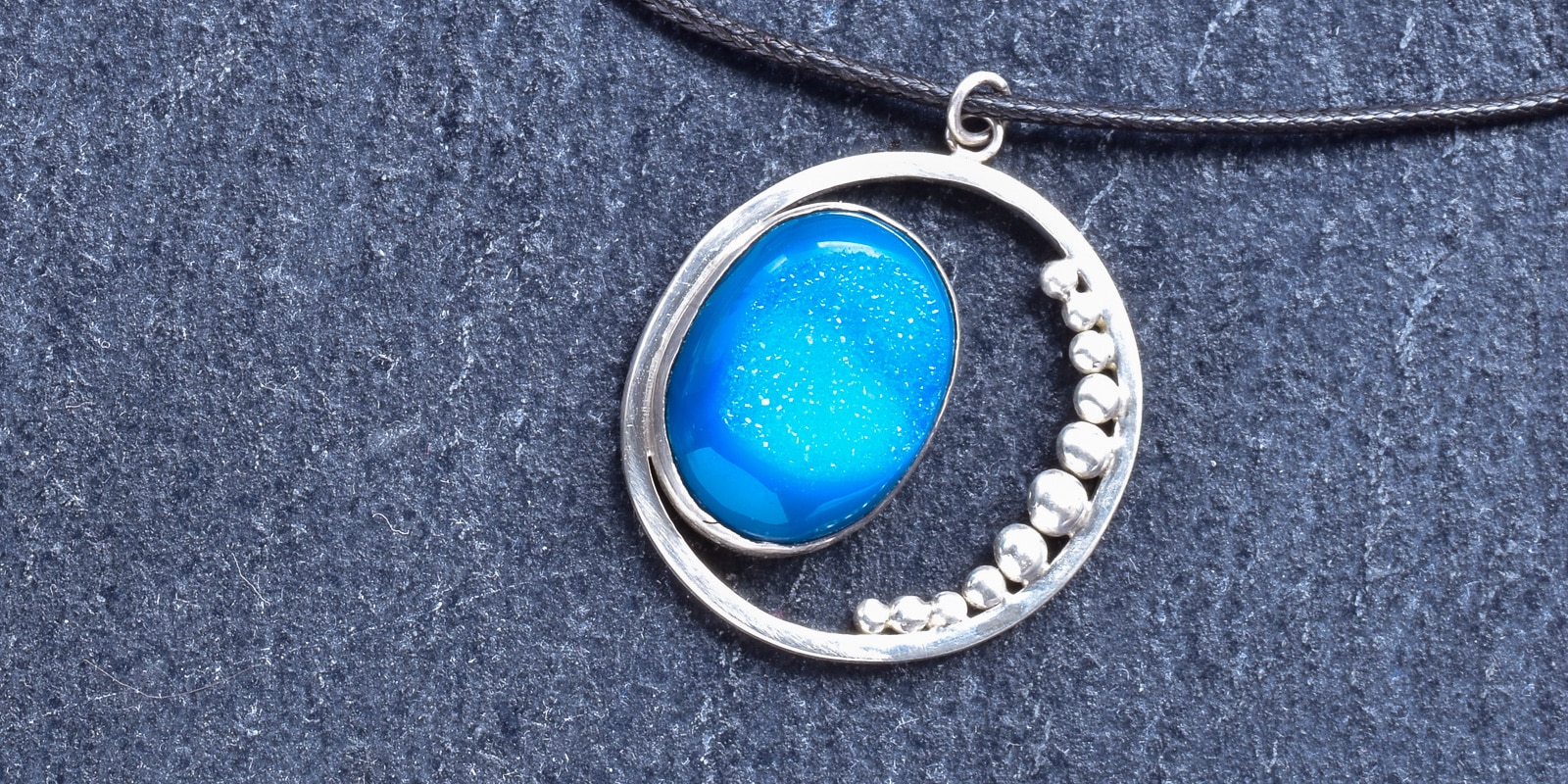 Anhänger Balance der Gezeiten Header