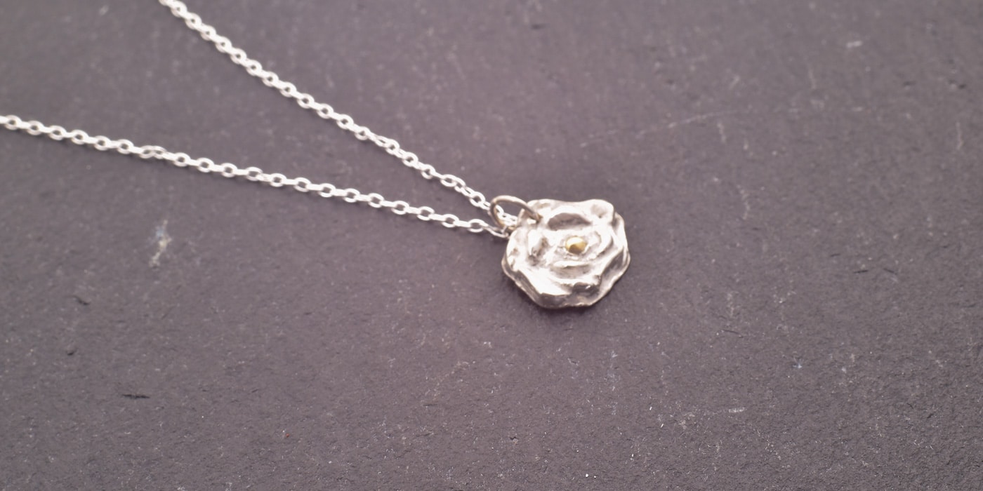 Anhänger Blüte des Lichts Header