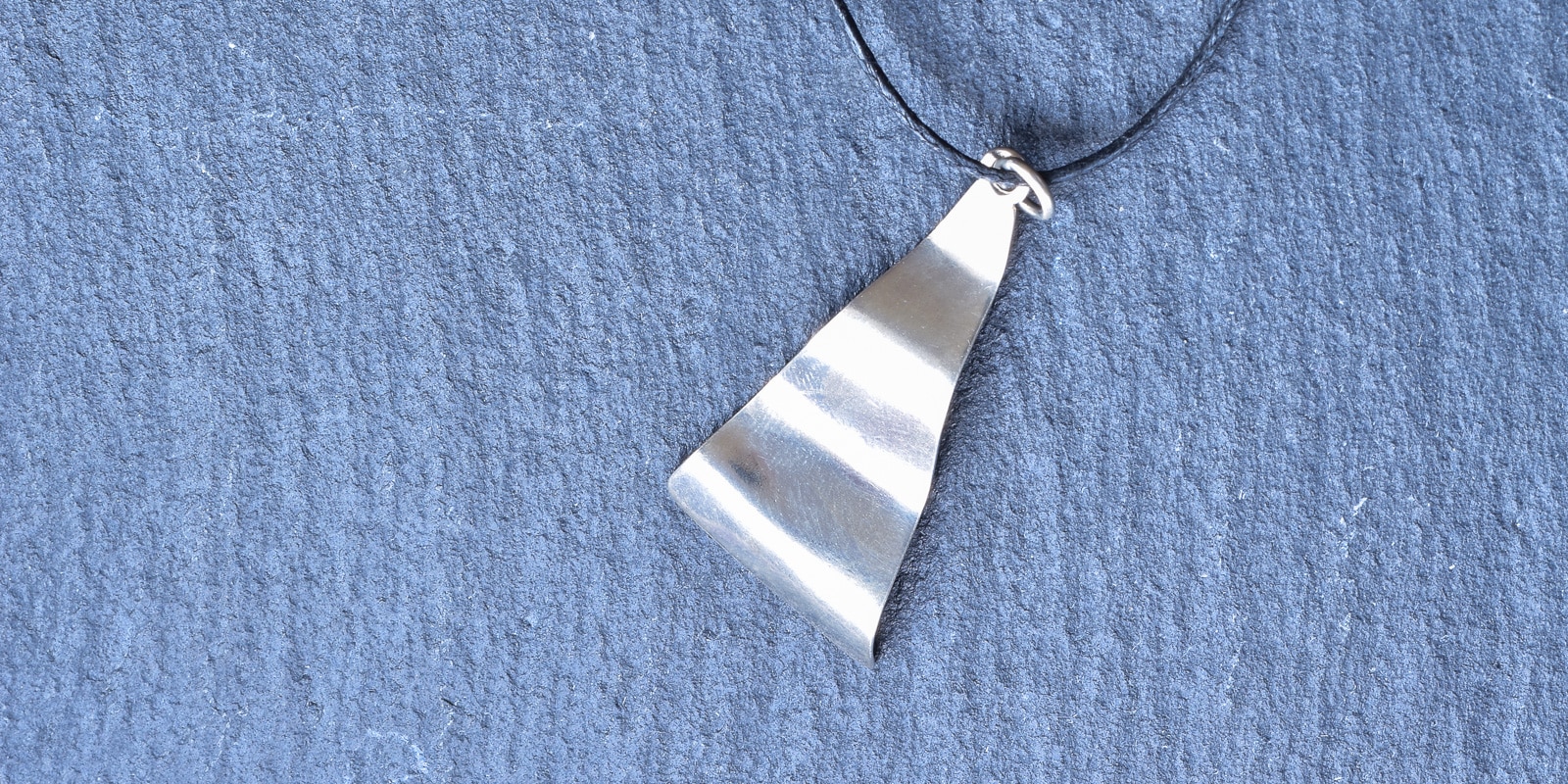 Anhänger Welle im Licht Header